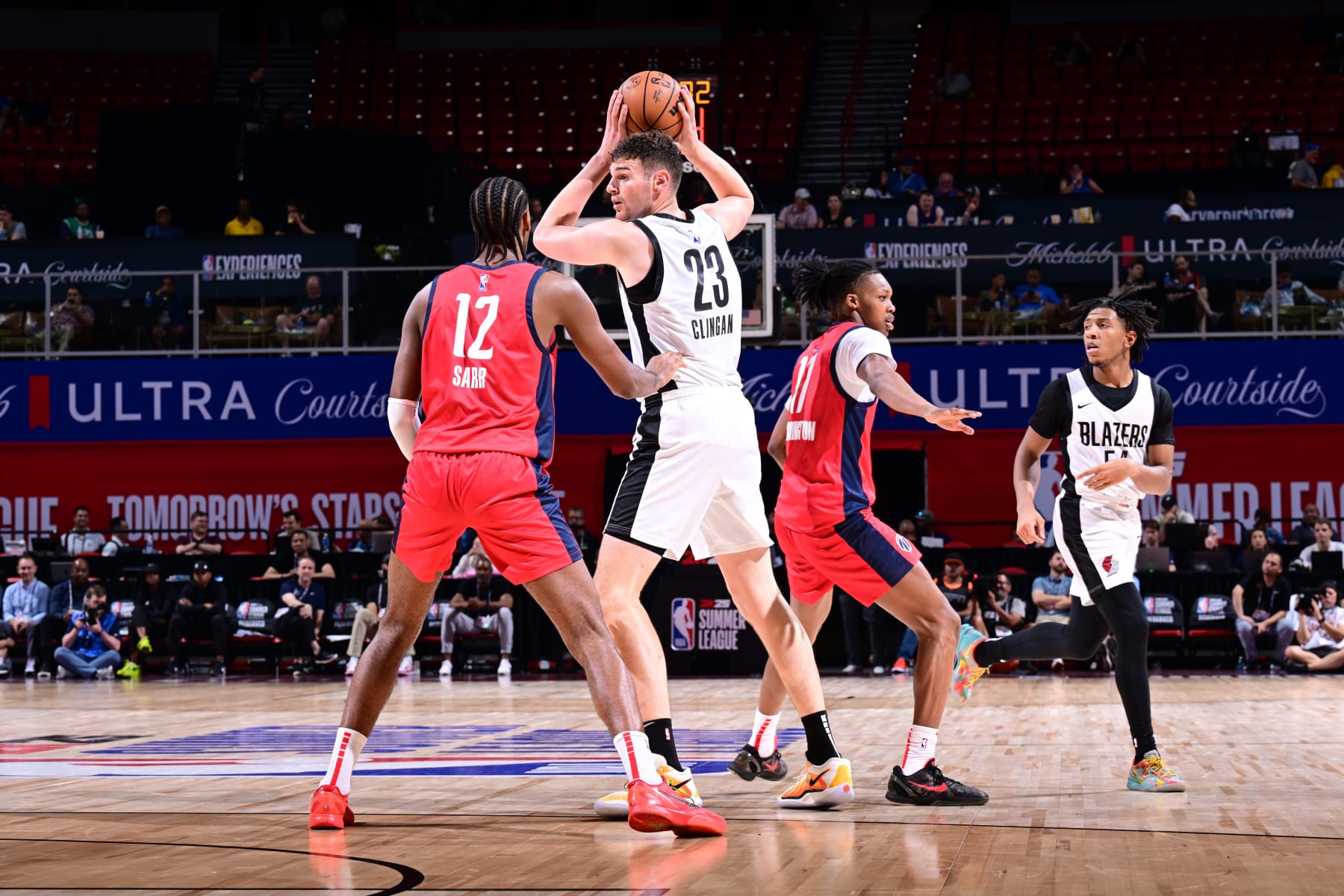 LAS VEGAS, NV - JULY 16:  Donovan Clingan #23 of the Portland Trail Blazers handles the ball during the game  on July 16, 2024 at the Thomas & Mack Center in Las Vegas, Nevada. NOTE TO USER: User expressly acknowledges and agrees that, by downloading and or using this photograph, User is consenting to the terms and conditions of the Getty Images License Agreement. Mandatory Copyright Notice: Copyright 2024 NBAE (Photo by Adam Hagy/NBAE via Getty Images)
