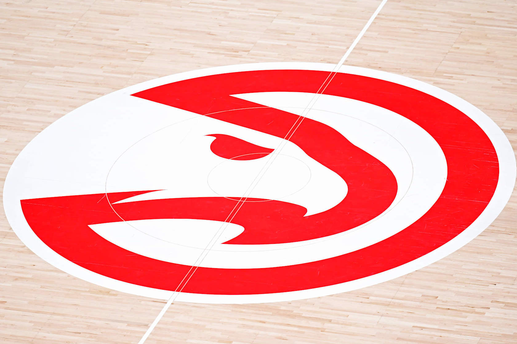 ATLANTA, GA - OCTOBER 23: Detailed shot of Atlanta Hawks center court logo during the game against the Brooklyn Nets on October 23, 2024 at State Farm Arena in Atlanta, Georgia.  NOTE TO USER: User expressly acknowledges and agrees that, by downloading and/or using this Photograph, user is consenting to the terms and conditions of the Getty Images License Agreement. Mandatory Copyright Notice: Copyright 2024 NBAE (Photo by Adam Hagy/NBAE via Getty Images)