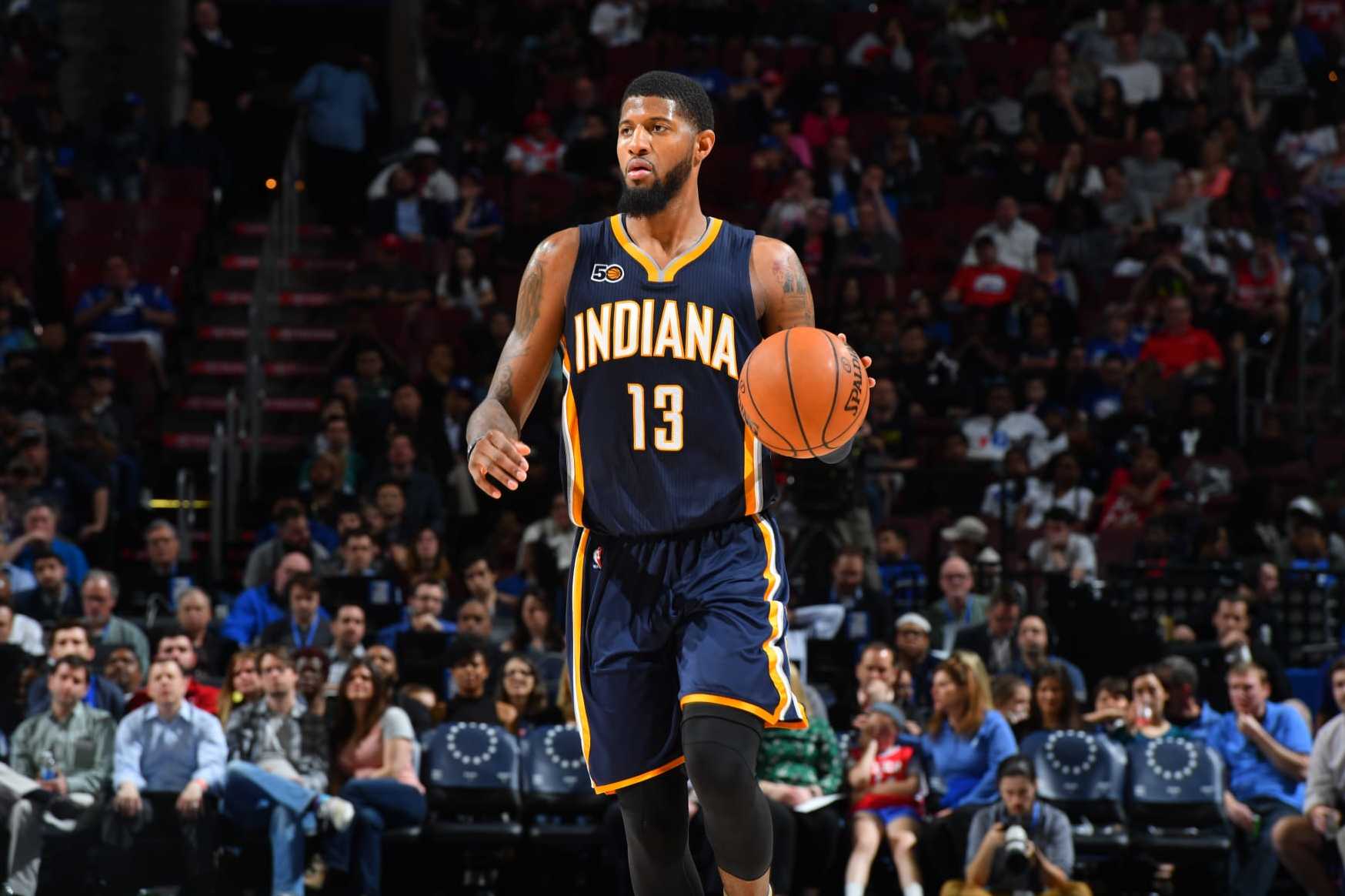 PHILADELPHIA,PA -  APRIL 10 : Paul George #13 of the Indiana Pacers dribbles the ball against the Philadelphia 76ers at Wells Fargo Center on April 10, 2017 in Philadelphia, Pennsylvania NOTE TO USER: User expressly acknowledges and agrees that, by downloading and/or using this Photograph, user is consenting to the terms and conditions of the Getty Images License Agreement. Mandatory Copyright Notice: Copyright 2017 NBAE (Photo by Jesse D. Garrabrant/NBAE via Getty Images)