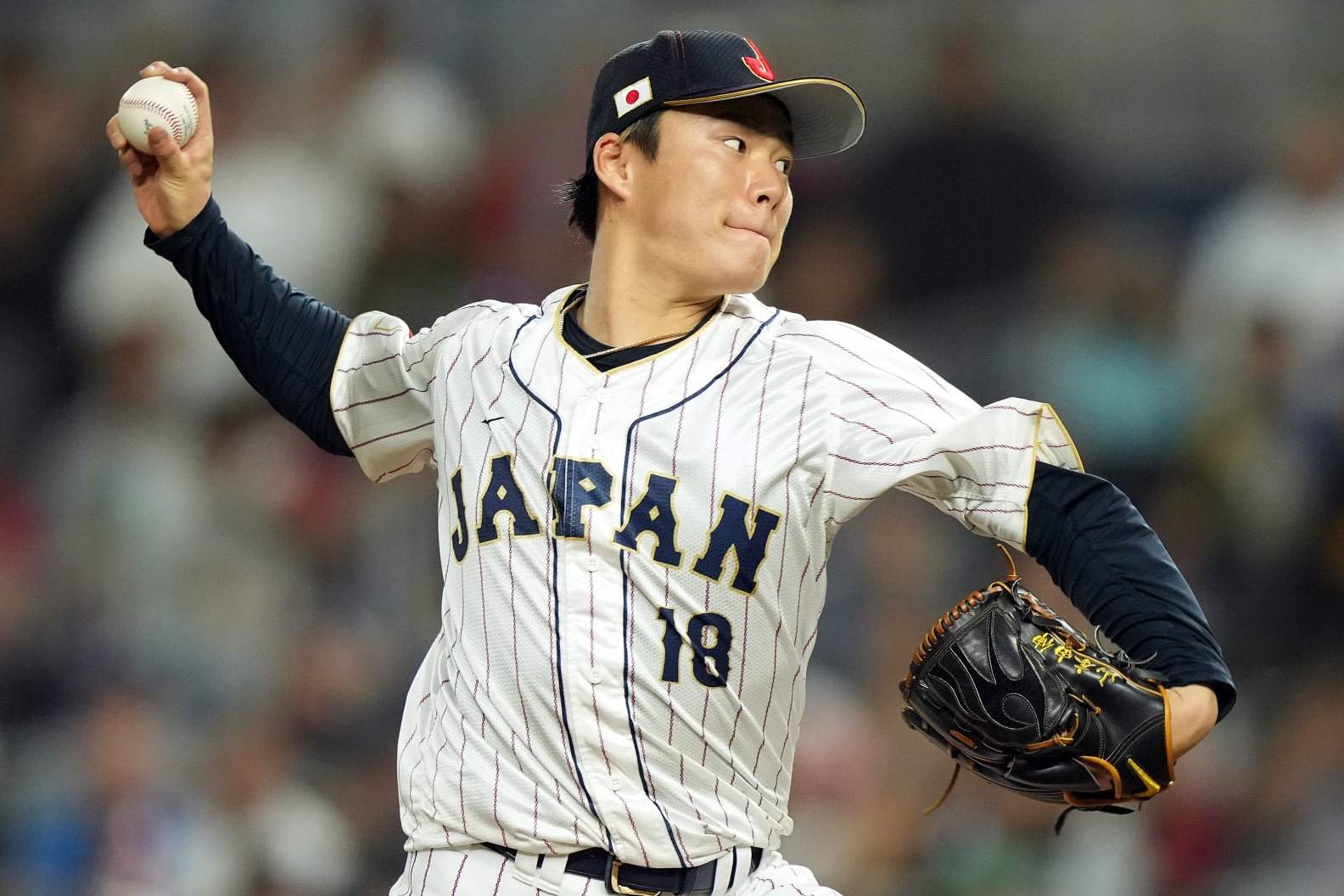 MIAMI, FLORIDA - MARCH 20: Yoshinobu Yamamoto #18 of Team Japan pitches in the eighth inning against Team Mexico during the World Baseball Classic Semifinals at loanDepot park on March 20, 2023 in Miami, Florida. (Photo by Eric Espada/Getty Images)