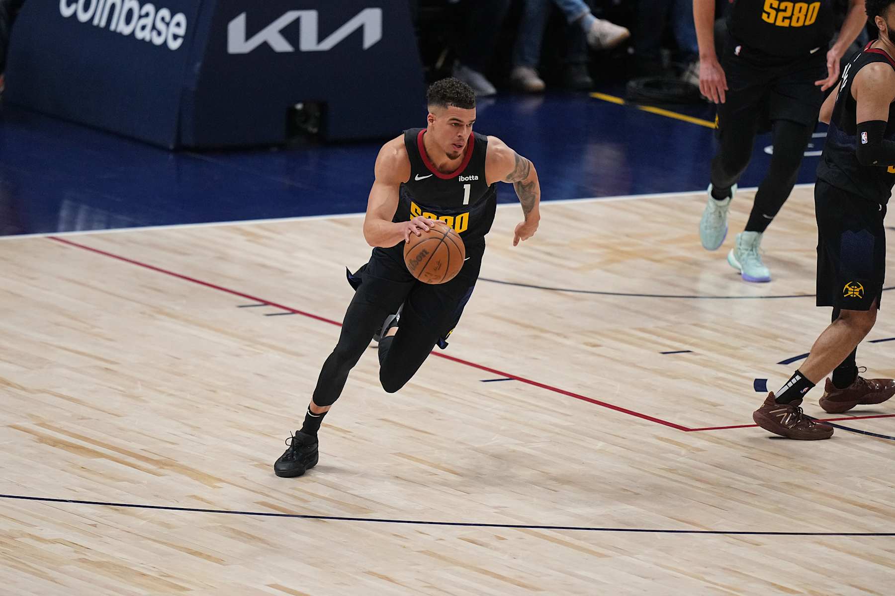 DENVER, CO - MAY 14: Michael Porter Jr. #1 of the Denver Nuggets brings the ball up court during the game against the Minnesota Timberwolves during Round 2 Game 5 of the 2024 NBA Playoffs on May 14, 2024 at the Ball Arena in Denver, Colorado. NOTE TO USER: User expressly acknowledges and agrees that, by downloading and/or using this Photograph, user is consenting to the terms and conditions of the Getty Images License Agreement. Mandatory Copyright Notice: Copyright 2024 NBAE (Photo by Bart Young/NBAE via Getty Images)