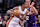 PHOENIX, ARIZONA - NOVEMBER 06: Kel'el Ware #7 of the Miami Heat drives against Mason Plumlee #22 of the Phoenix Suns during the game at Footprint Center on November 06, 2024 in Phoenix, Arizona. The Suns defeated the Heat 115-112. NOTE TO USER: User expressly acknowledges and agrees that, by downloading and or using this photograph, User is consenting to the terms and conditions of the Getty Images License Agreement. (Photo by Chris Coduto/Getty Images)