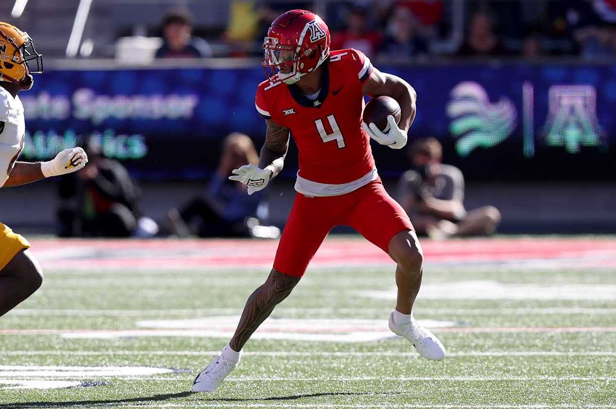 TUCSON, AZ - NOVEMBER 30: Arizona Wildcats wide receiver Tetairoa McMillan #4 during the first half of a football game between the Arizona State University Sun Devils and the University of Arizona Wildcats.  November 30, 2024 at Arizona Stadium in Tucson, AZ. (Photo by Christopher Hook/Icon Sportswire via Getty Images)