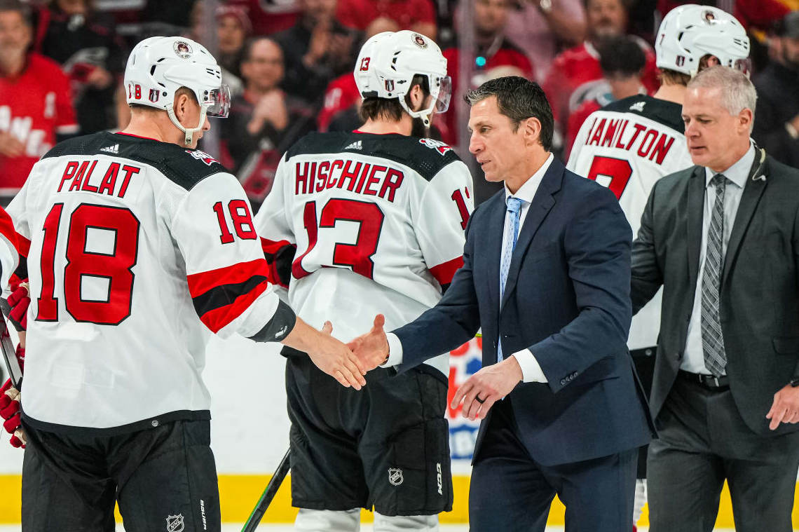 RALEIGH, NORTH CAROLINA - MAY 11: The Carolina Hurricanes and the New Jersey Devils shake hands after Game Five of the Second Round of the 2023 Stanley Cup Playoffs at PNC Arena on May 11, 2023 in Raleigh, North Carolina. (Photo by Josh Lavallee/NHLI via Getty Images)