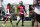 San Francisco 49ers wide receiver Brandon Aiyuk (11), right, turns back to talk with Tavon Austin (5) during NFL Training Camp practice Saturday, Aug. 15, 2020, at the SAP Performance Facility in Santa Clara, Calif. (Xavier Mascarenas/The Sacramento Bee via AP)