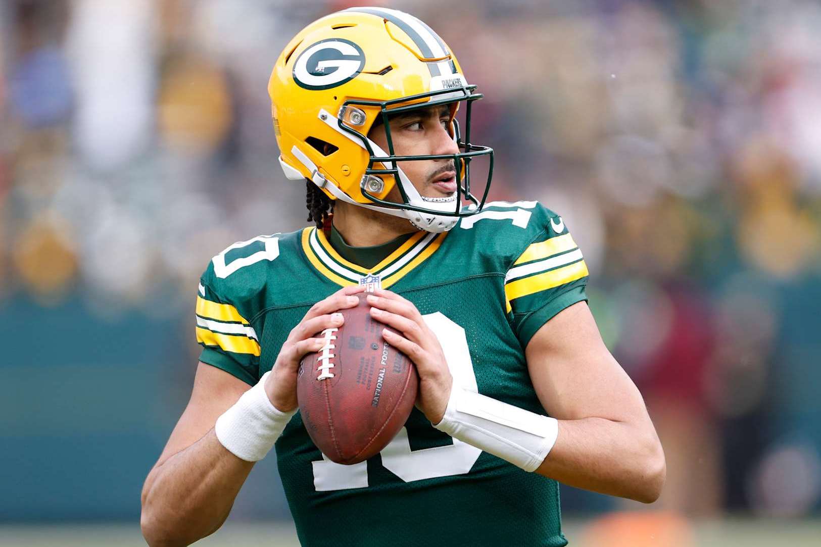 GREEN BAY, WISCONSIN - JANUARY 05: Jordan Love #10 of the Green Bay Packers warms up before the game against the Chicago Bears at Lambeau Field on January 05, 2025 in Green Bay, Wisconsin. (Photo by John Fisher/Getty Images)