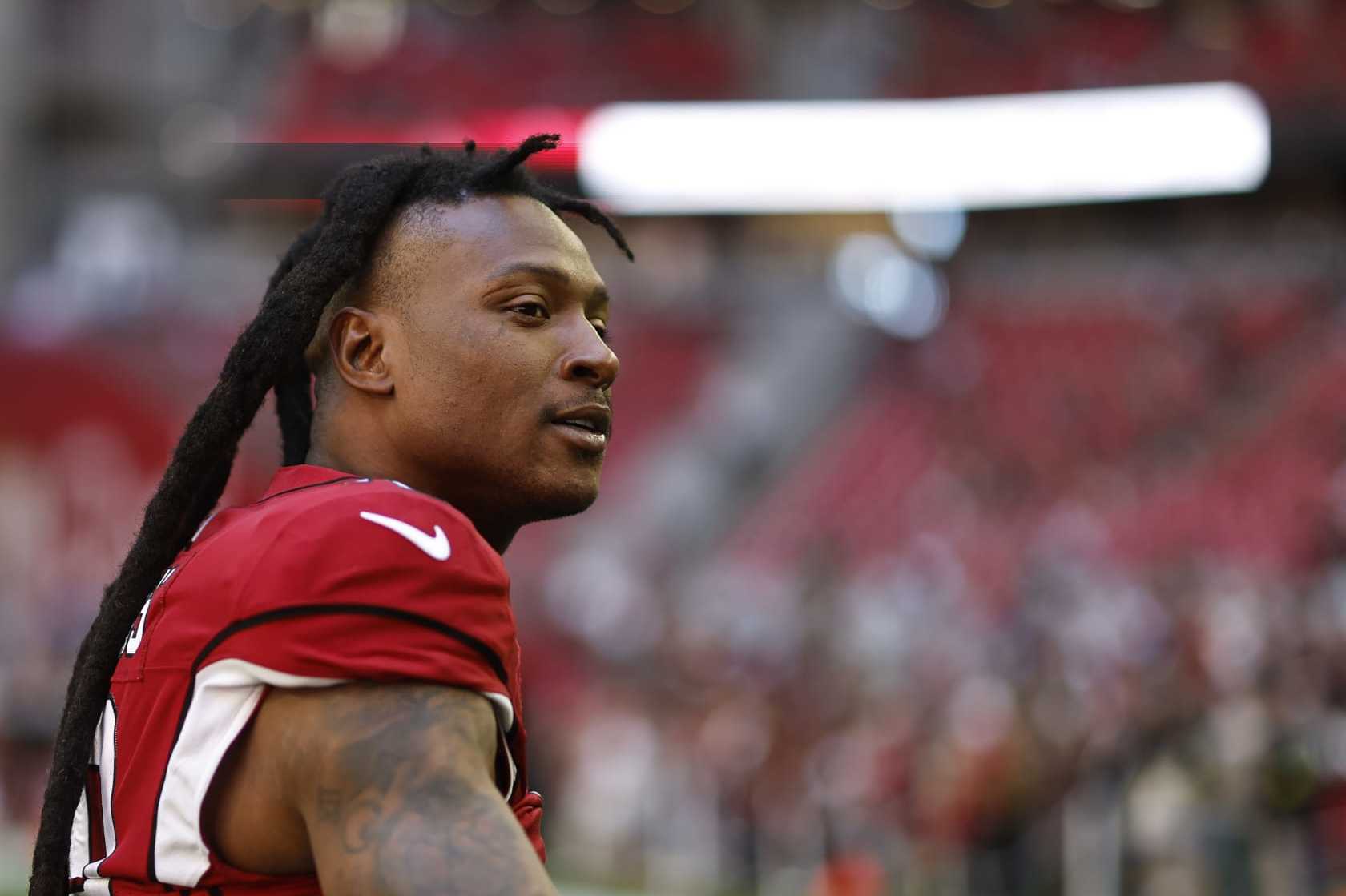 GLENDALE, ARIZONA - NOVEMBER 06: DeAndre Hopkins #10 of the Arizona Cardinals reacts prior to an NFL Football game between the Arizona Cardinals and the Seattle Seahawks at State Farm Stadium on November 06, 2022 in Glendale, Arizona. (Photo by Michael Owens/Getty Images)
