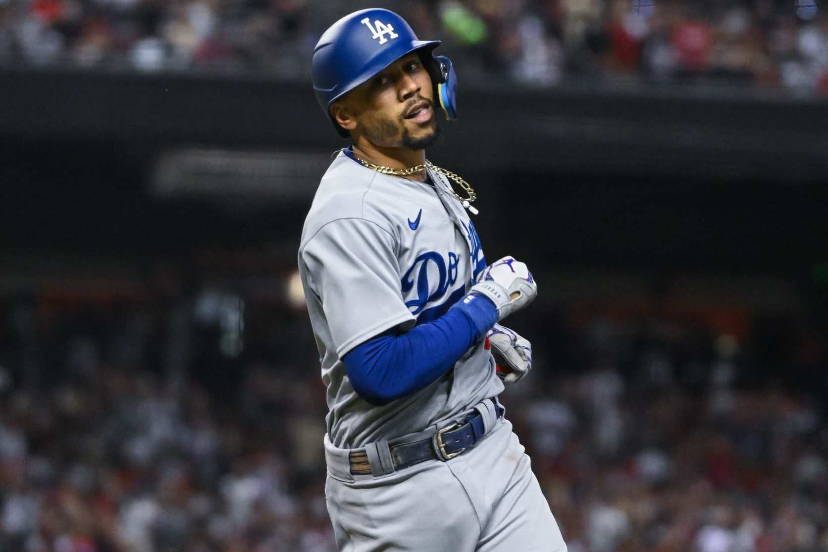 Dodgers fan interferes with Mookie Betts double, immediately bolts