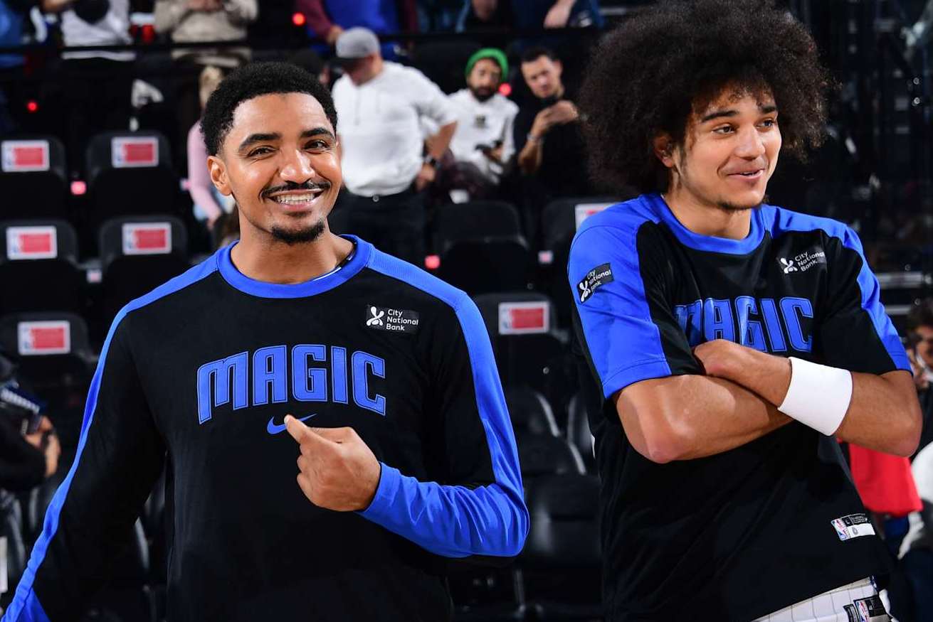 INGLEWOOD, CA - NOVEMBER 20: Gary Harris #14 and Anthony Black #0 of the Orlando Magic smile before the game against the LA Clippers on November 20, 2024 at Intuit Dome in Los Angeles, California. NOTE TO USER: User expressly acknowledges and agrees that, by downloading and/or using this Photograph, user is consenting to the terms and conditions of the Getty Images License Agreement. Mandatory Copyright Notice: Copyright 2024 NBAE (Photo by Adam Pantozzi/NBAE via Getty Images)
