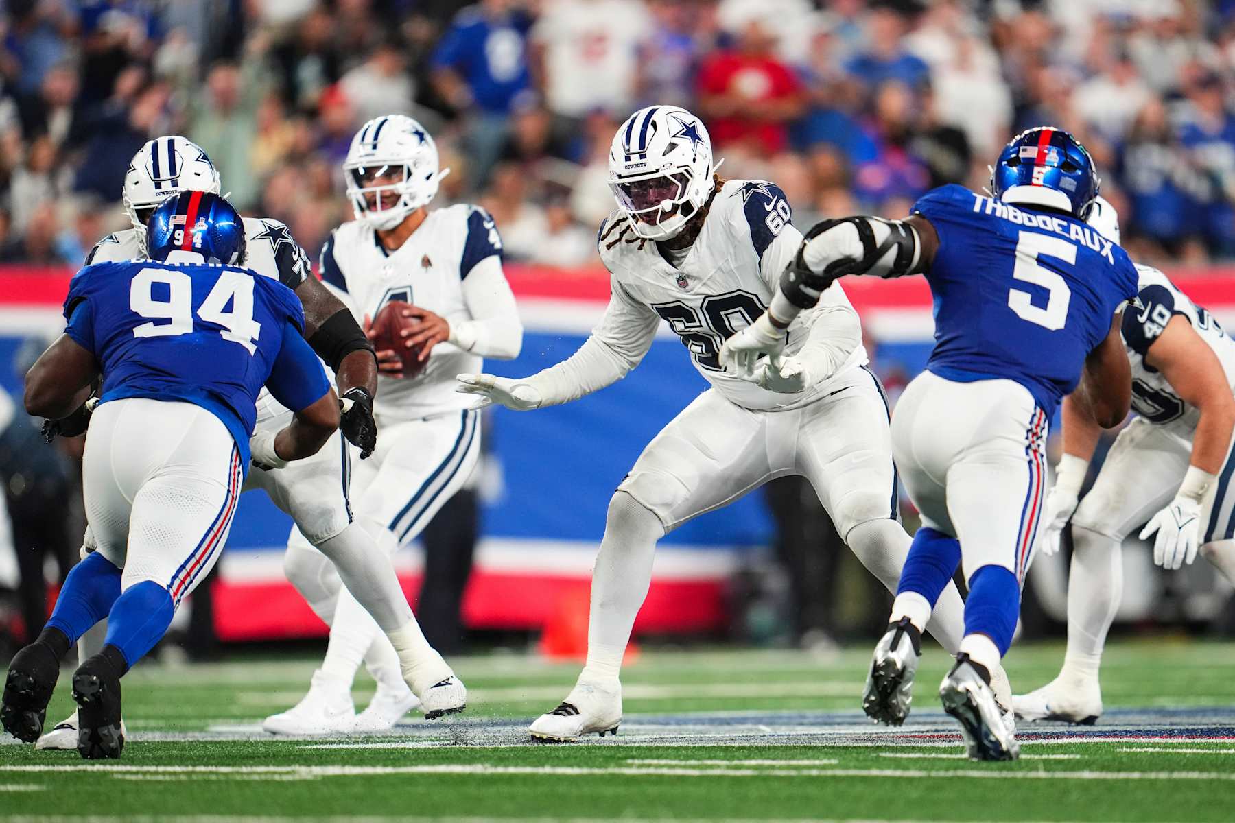 EAST RUTHERFORD, NJ - SEPTEMBER 26: Tyler Guyton #60 of the Dallas Cowboys drops back to block during an NFL football game against the New York Giants at MetLife Stadium on September 26, 2024 in East Rutherford, New Jersey. (Photo by Cooper Neill/Getty Images)