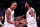 NEW YORK, NEW YORK - OCTOBER 25: Isaac Okoro #35 of the Cleveland Cavaliers, Max Strus #1 of the Cleveland Cavaliers, and Donovan Mitchell #45 of the Cleveland Cavaliers react after defeating the Brooklyn Nets in the game at Barclays Center on October 25, 2023 in New York City. NOTE TO USER: User expressly acknowledges and agrees that, by downloading and or using this photograph, User is consenting to the terms and conditions of the Getty Images License Agreement. (Photo by Dustin Satloff/Getty Images)