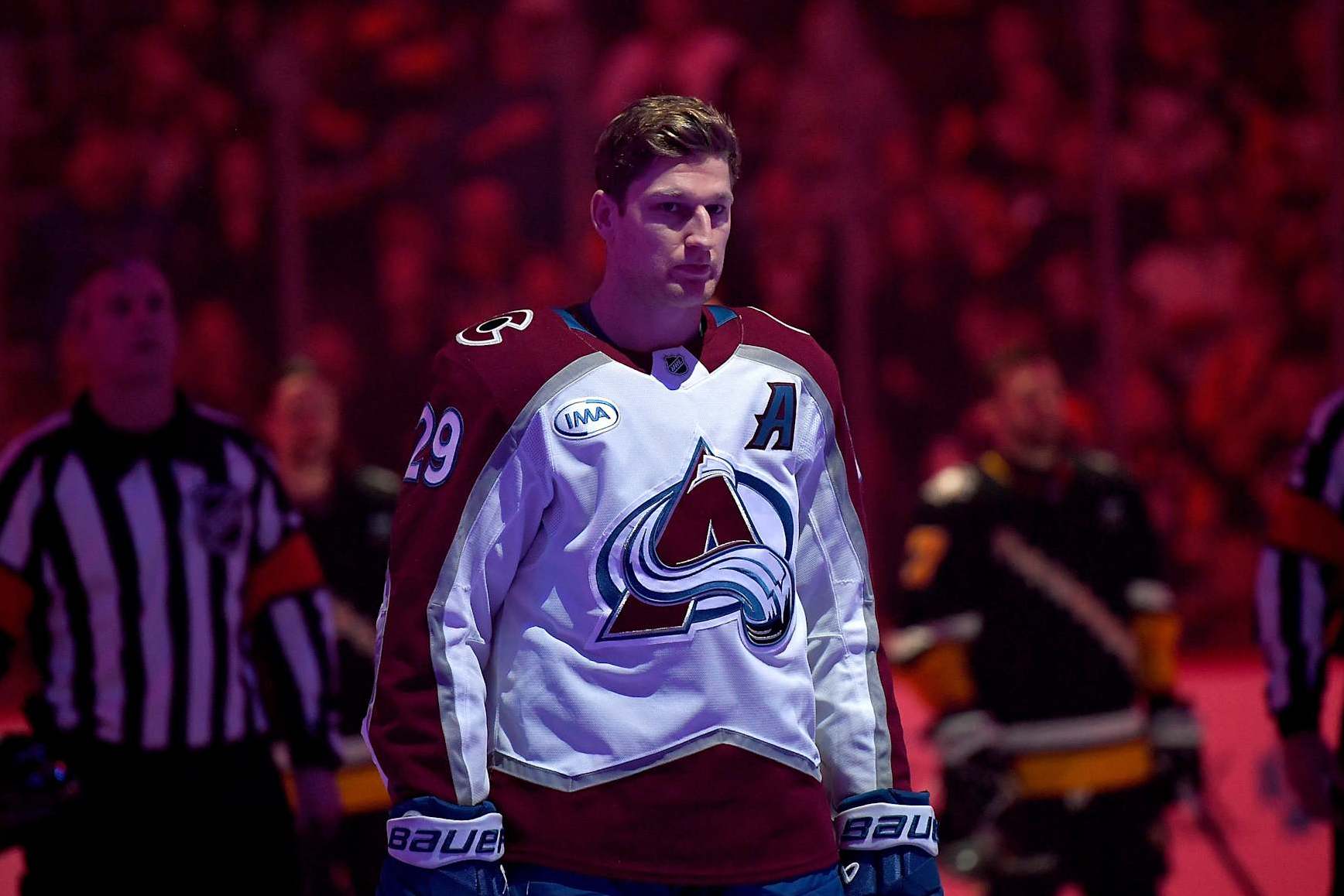 PITTSBURGH, PA - DECEMBER 10: Nathan MacKinnon #29 of the Colorado Avalanche stands during the National Anthem against the Pittsburgh Penguins at PPG PAINTS Arena on December 10, 2024 in Pittsburgh, Pennsylvania. (Photo by Joe Sargent/NHLI via Getty Images)