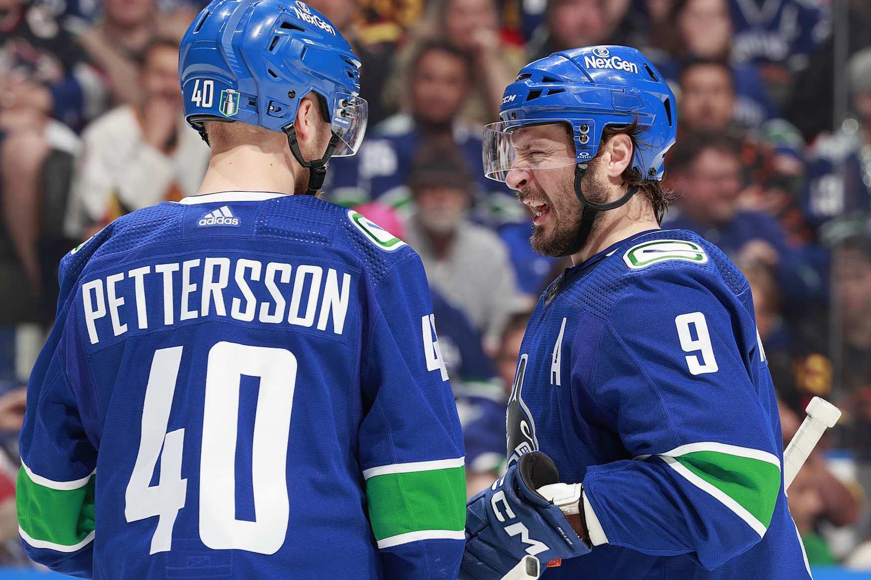 VANCOUVER, CANADA - MAY 10: J.T. Miller #9 of the Vancouver Canucks talks to teammate Elias Pettersson #40 in Game Two of the Second Round of the 2024 Stanley Cup Playoffs against the Edmonton Oilers at Rogers Arena on May 10, 2024 in Vancouver, British Columbia, Canada. (Photo by Jeff Vinnick/NHLI via Getty Images)
