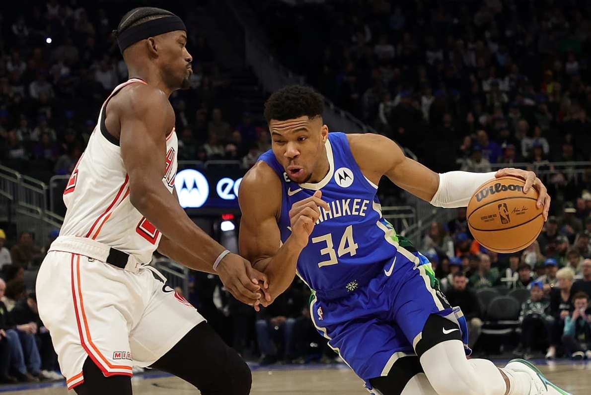 MILWAUKEE, WISCONSIN - FEBRUARY 04: Giannis Antetokounmpo #34 of the Milwaukee Bucks is defended by Jimmy Butler #22 of the Miami Heat during a game at Fiserv Forum on February 04, 2023 in Milwaukee, Wisconsin. NOTE TO USER: User expressly acknowledges and agrees that, by downloading and or using this photograph, User is consenting to the terms and conditions of the Getty Images License Agreement. (Photo by Stacy Revere/Getty Images) MILWAUKEE, WISCONSIN - FEBRUARY 04: Giannis Antetokounmpo #34 of the Milwaukee Bucks is defended by Jimmy Butler #22 of the Miami Heat during a game at Fiserv Forum on February 04, 2023 in Milwaukee, Wisconsin. NOTE TO USER: User expressly acknowledges and agrees that, by downloading and or using this photograph, User is consenting to the terms and conditions of the Getty Images License Agreement. (Photo by Stacy Revere/Getty Images)