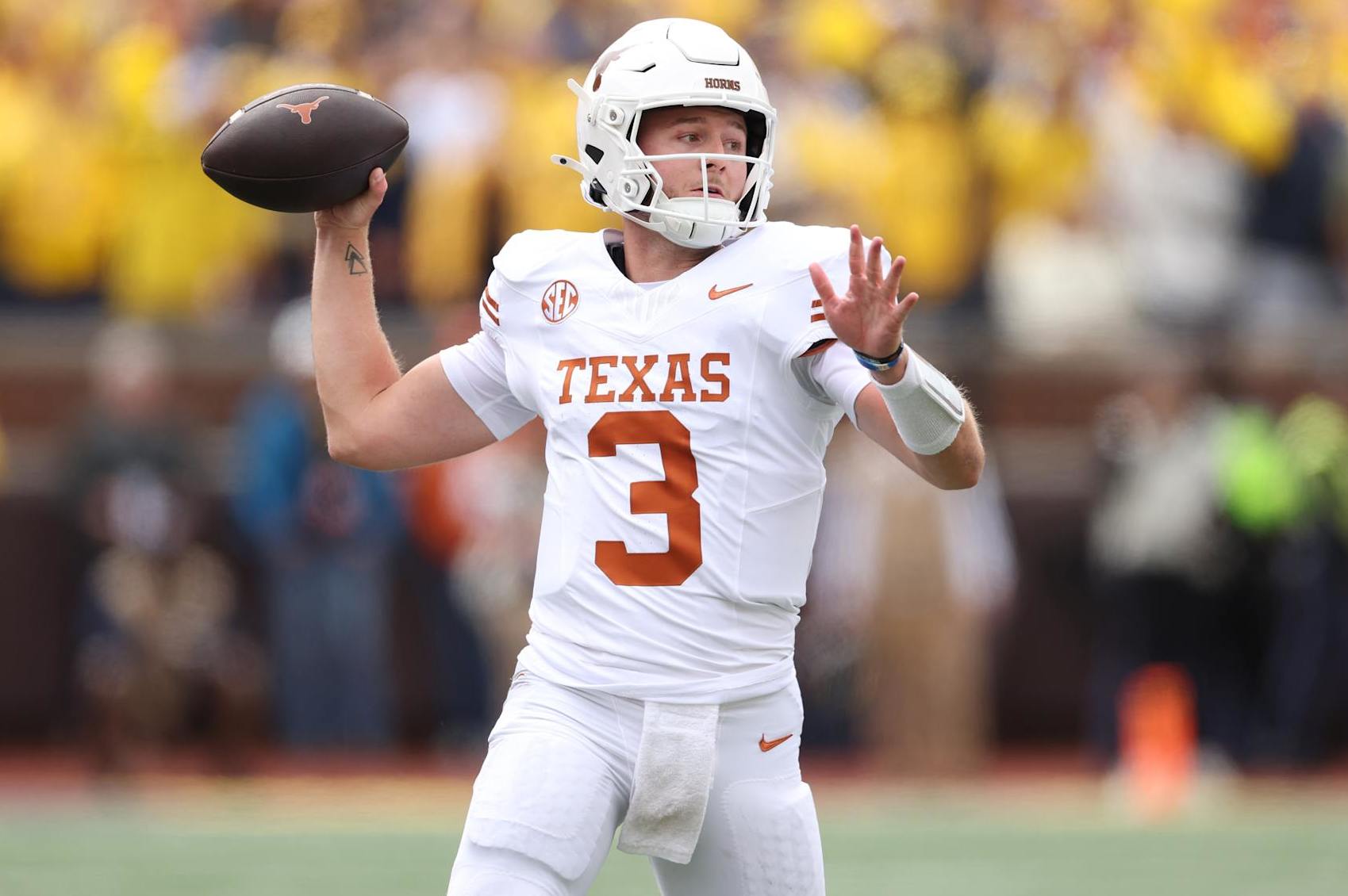 ANN ARBOR, MICHIGAN - SEPTEMBER 07: Quinn Ewers #3 of the Texas Longhorns looks to pass during the first quarter against the Michigan Wolverines at Michigan Stadium on September 07, 2024 in Ann Arbor, Michigan. (Photo by Gregory Shamus/Getty Images)