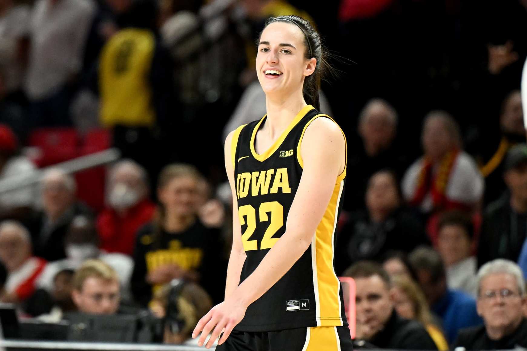 COLLEGE PARK, MARYLAND - FEBRUARY 03: Caitlin Clark #22 of the Iowa Hawkeyes celebrates in the fourth quarter against the Maryland Terrapins at Xfinity Center on February 03, 2024 in College Park, Maryland. (Photo by G Fiume/Getty Images)