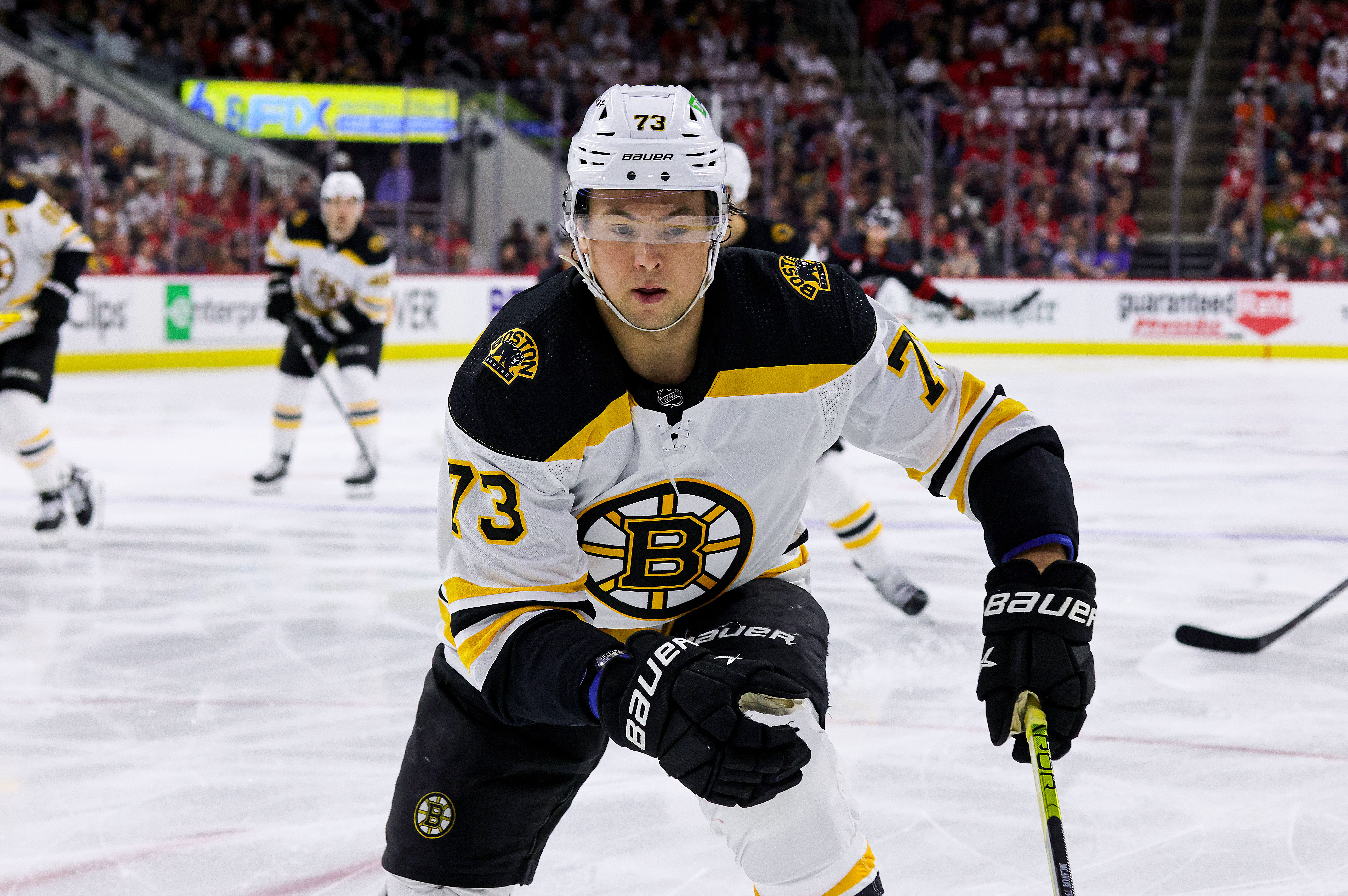 RALEIGH, NC - MAY 2: Charlie McAvoy #73 of the Boston Bruins skates into the corner to play the puck in Game One of the First Round of the 2022 Stanley Cup Playoffs against the Carolina Hurricanes on May 2, 2022 at PNC Arena in Raleigh, North Carolina. (Photo by Gregg Forwerck/NHLI via Getty Images)
