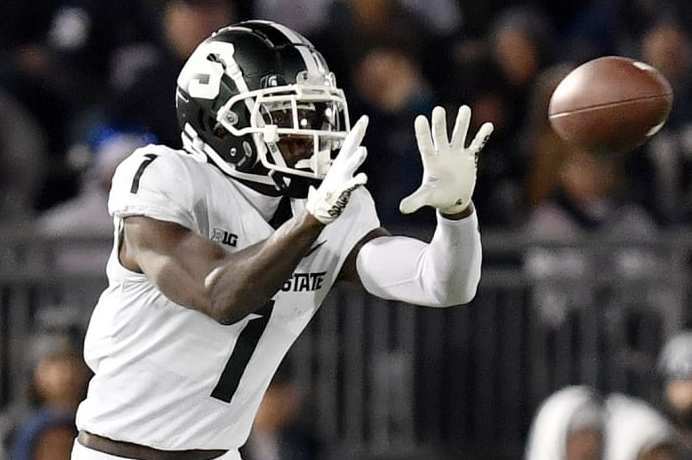 UNIVERSITY PARK, PA - NOVEMBER 26: Michigan State wide receiver Jayden Reed (1) catches a pass during the Michigan State Spartans versus Penn State Nittany Lions game on November 26, 2022 at Beaver Stadium in University Park, PA. (Photo by Randy Litzinger/Icon Sportswire via Getty Images)