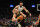 BOSTON, MASSACHUSETTS - JUNE 08: Stephen Curry #30 of the Golden State Warriors loses control of the ball against Jayson Tatum #0 of the Boston Celtics in the fourth quarter during Game Three of the 2022 NBA Finals at TD Garden on June 08, 2022 in Boston, Massachusetts. The Boston Celtics won 116-100. NOTE TO USER: User expressly acknowledges and agrees that, by downloading and/or using this photograph, User is consenting to the terms and conditions of the Getty Images License Agreement. (Photo by Maddie Meyer/Getty Images)