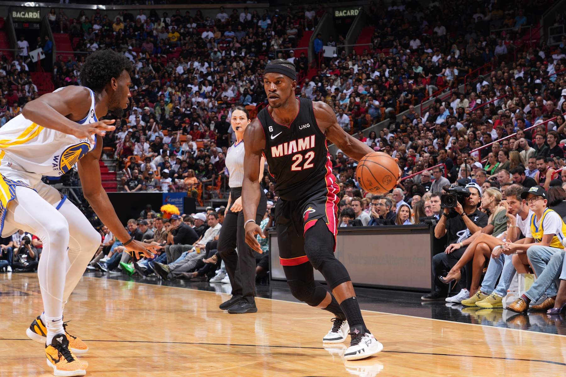 MIAMI, FL - NOVEMBER 1: Jimmy Butler #22 of the Miami Heat dribbles the ball during the game against the Golden State Warriors on November 1, 2022 at FTX Arena in Miami, Florida. NOTE TO USER: User expressly acknowledges and agrees that, by downloading and or using this Photograph, user is consenting to the terms and conditions of the Getty Images License Agreement. Mandatory Copyright Notice: Copyright 2022 NBAE (Photo by Jesse D. Garrabrant/NBAE via Getty Images)