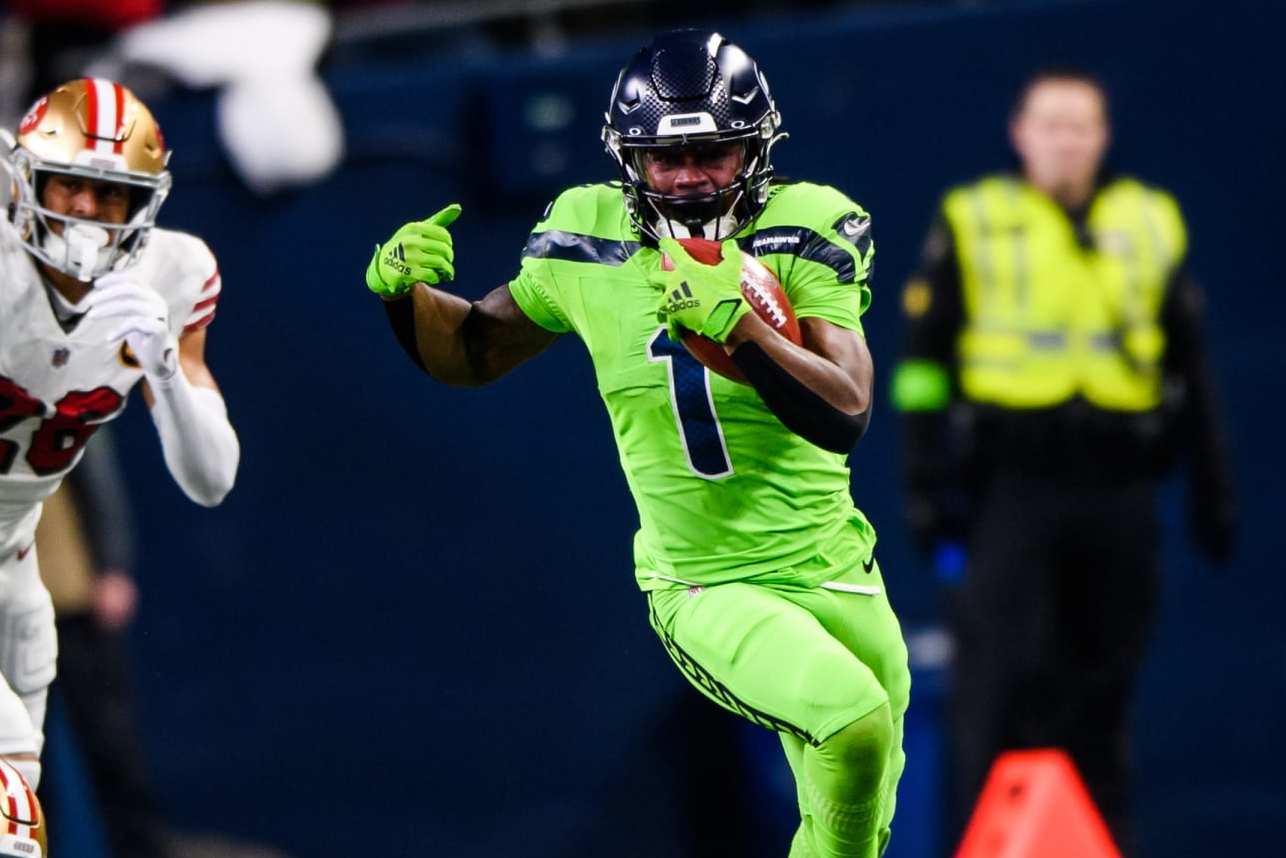 SEATTLE, WASHINGTON - NOVEMBER 23: Seattle Seahawks wide receiver Dee Eskridge #1 carries the ball during the first quarter of the game against the San Francisco 49ers at Lumen Field on November 23, 2023 in Seattle, Washington. (Photo by Jane Gershovich/Getty Images)