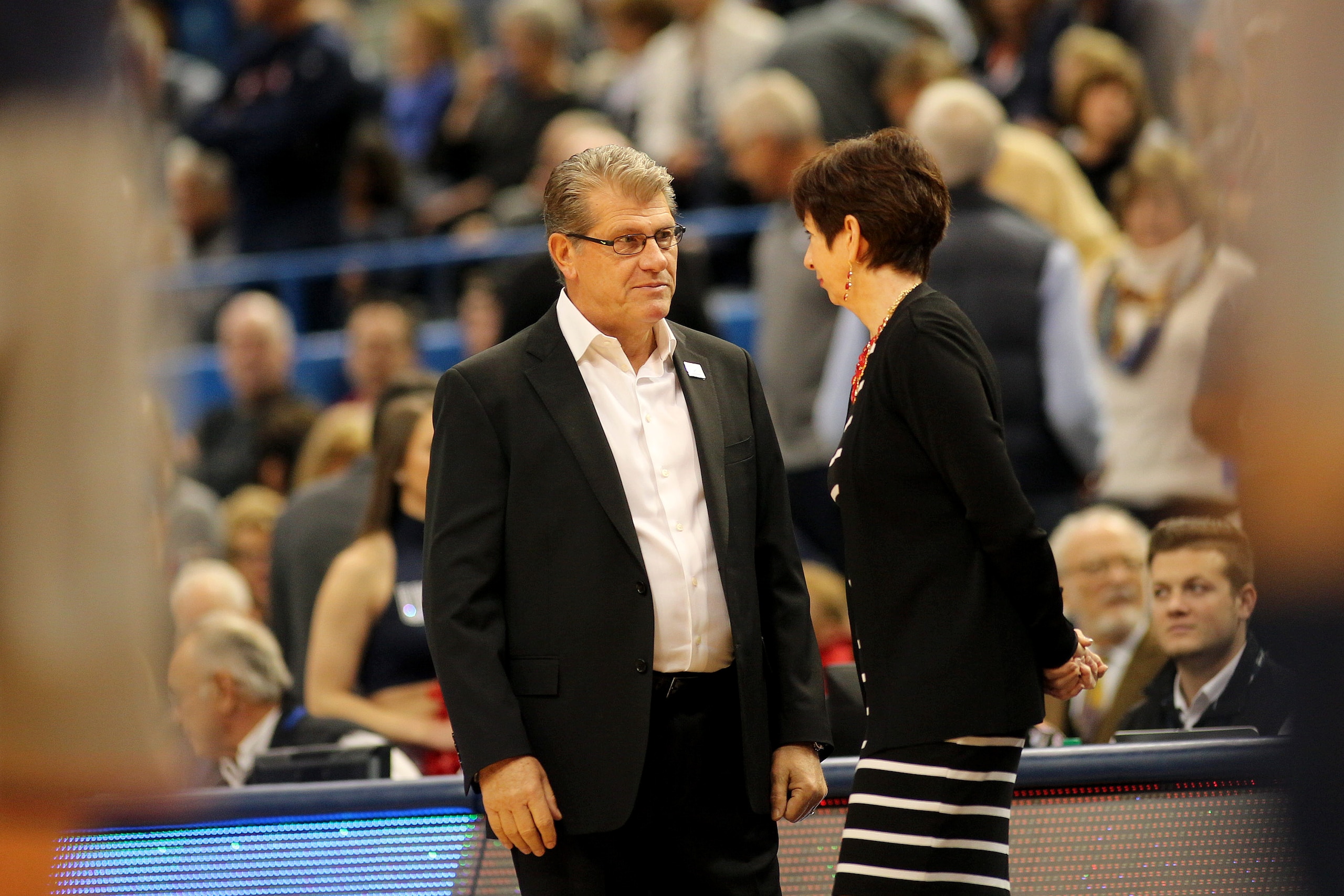 HARTFORD, CONNECTICUT- DECEMBER 03:  Head coach Geno Auriemma of the Connecticut Huskies and head coach Muffet McGraw of the Notre Dame Fighting Irish greet each other before the the UConn Huskies Vs Notre Dame, NCAA Women's Basketball game at the XL Center, Hartford, Connecticut. December 3, 2017 (Photo by Tim Clayton/Corbis via Getty Images)