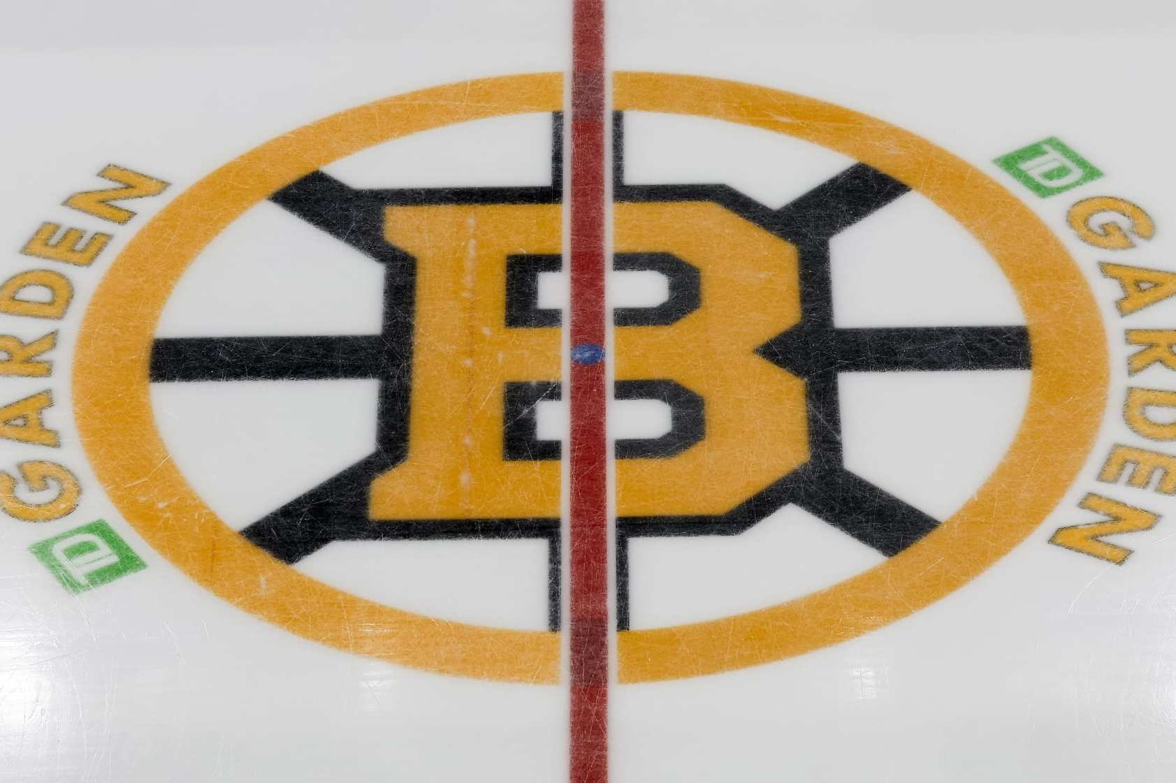 BOSTON, MASSACHUSETTS - FEBRUARY 10: The Boston Bruins logo is seen at center ice before the game between the Boston Bruins and the Washington Capitals at TD Garden on February 10, 2024 in Boston, Massachusetts. (Photo By Winslow Townson/Getty Images)