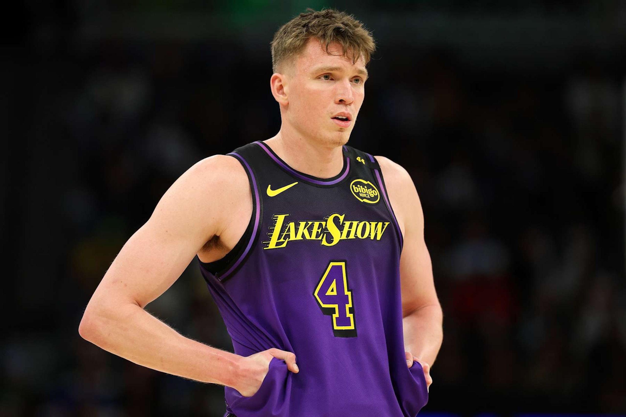 MINNEAPOLIS, MINNESOTA - DECEMBER 02: Dalton Knecht #4 of the Los Angeles Lakers looks on against the Minnesota Timberwolves in the third quarter at Target Center on December 02, 2024 in Minneapolis, Minnesota. The Timberwolves defeated the Lakers 109-80. NOTE TO USER: User expressly acknowledges and agrees that, by downloading and or using this photograph, User is consenting to the terms and conditions of the Getty Images License Agreement. (Photo by David Berding/Getty Images)