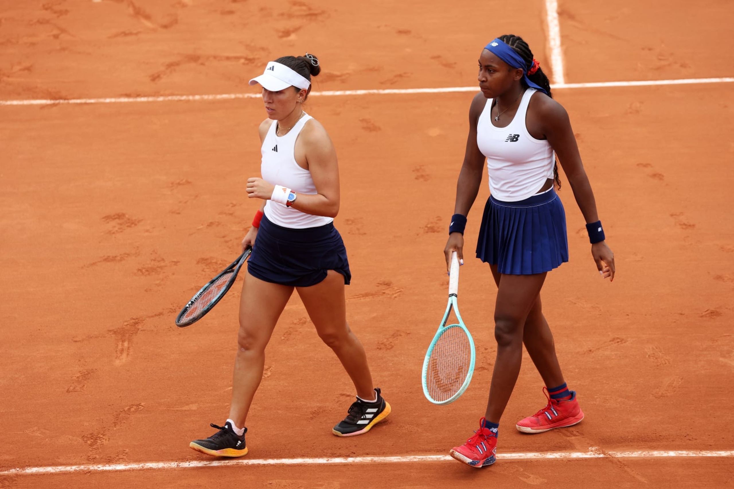 PARIS, FRANCE - JULY 31: Coco Gauff of Team United States looks on with partner Jessica Pegula of Team United States against Karolina Muchova of Team Czechia and Linda Noskova of Team Czechia during the Women's Doubles Second Round match on day five of the Olympic Games Paris 2024 at Roland Garros on July 31, 2024 in Paris, France. (Photo by Matthew Stockman/Getty Images)