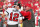 TAMPA, FL - JANUARY 9: Tampa Bay Buccaneers Quarterback Tom Brady (12) greets Head Coach Bruce Arians before the regular season game between the Carolina Panthers and the Tampa Bay Buccaneers on January 9, 2022 at Raymond James Stadium in Tampa, Florida. (Photo by Cliff Welch/Icon Sportswire via Getty Images)