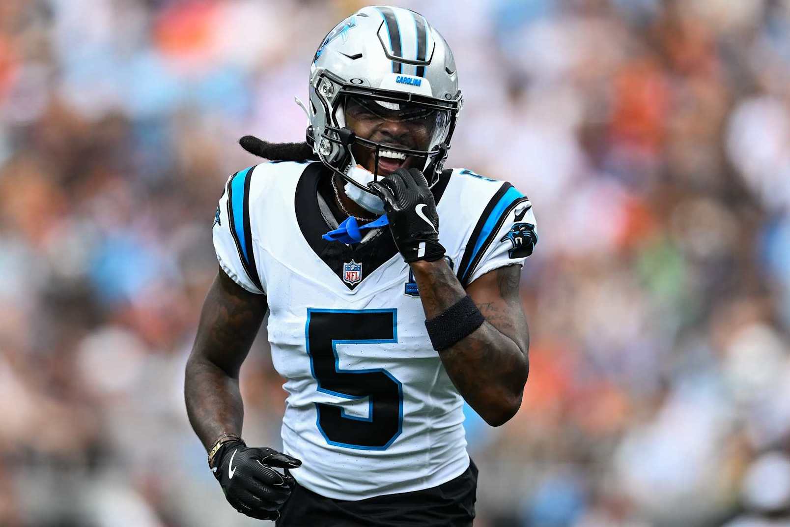 CHARLOTTE, NORTH CAROLINA - SEPTEMBER 29: Diontae Johnson (5) of the Carolina Panthers smiles during the first quarter of his game against the Cincinnati Bengals at Bank of America Stadium on September 29, 2024 in Charlotte, North Carolina. (Photo by Matt Kelley/Getty Images)