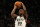 MILWAUKEE, WISCONSIN - OCTOBER 19: Khris Middleton #22 of the Milwaukee Bucks shoots a free throw against the Brooklyn Nets during the season opener at the Fiserv Forum on October 19, 2021 in Milwaukee, Wisconsin. NOTE TO USER: User expressly acknowledges and agrees that, by downloading and or using this photograph, User is consenting to the terms and conditions of the Getty Images License Agreement. (Photo by Stacy Revere/Getty Images)