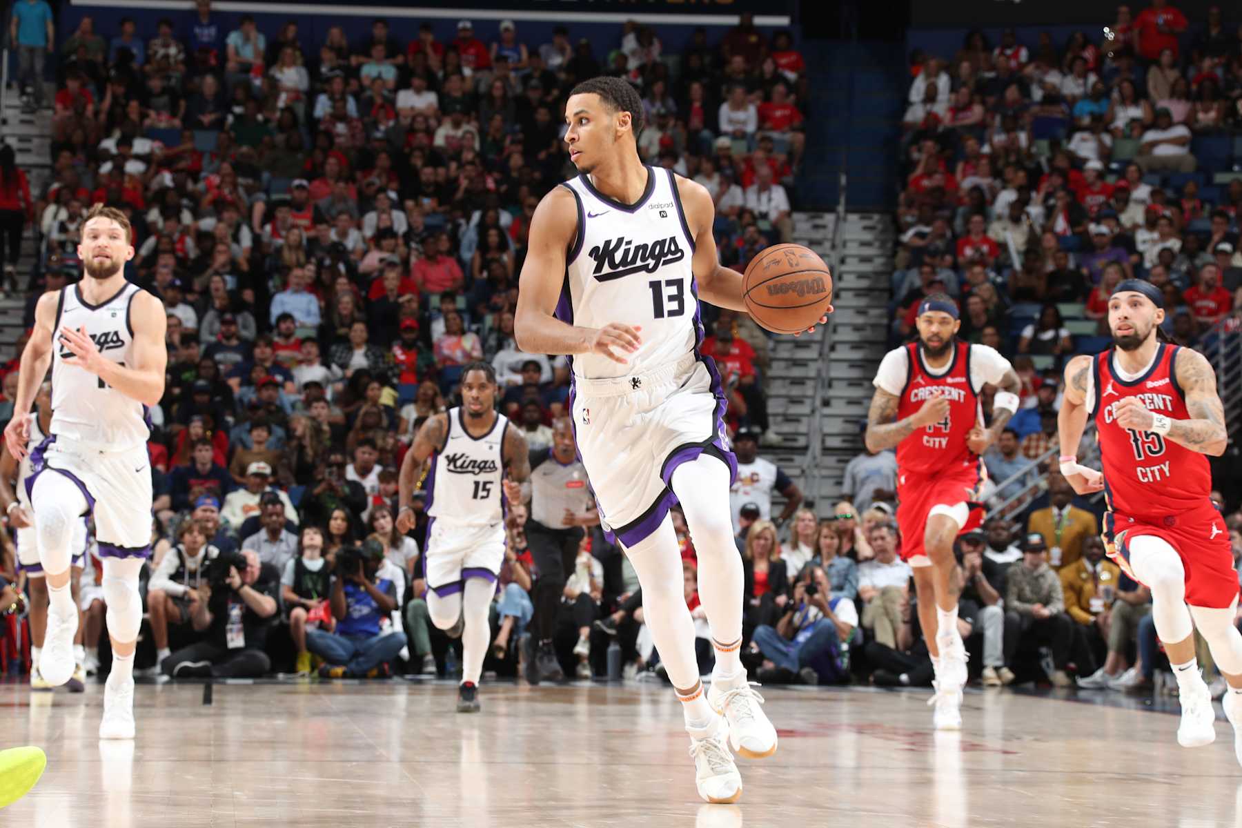 NEW ORLEANS, LA - APRIL 19: Keegan Murray #13 of the Sacramento Kings dribbles the ball during the game against the New Orleans Pelicans during the 2024 NBA Play-In Tournament on April 19, 2024 at the Smoothie King Center in New Orleans, Louisiana. NOTE TO USER: User expressly acknowledges and agrees that, by downloading and or using this Photograph, user is consenting to the terms and conditions of the Getty Images License Agreement. Mandatory Copyright Notice: Copyright 2024 NBAE (Photo by Layne Murdoch Jr./NBAE via Getty Images)