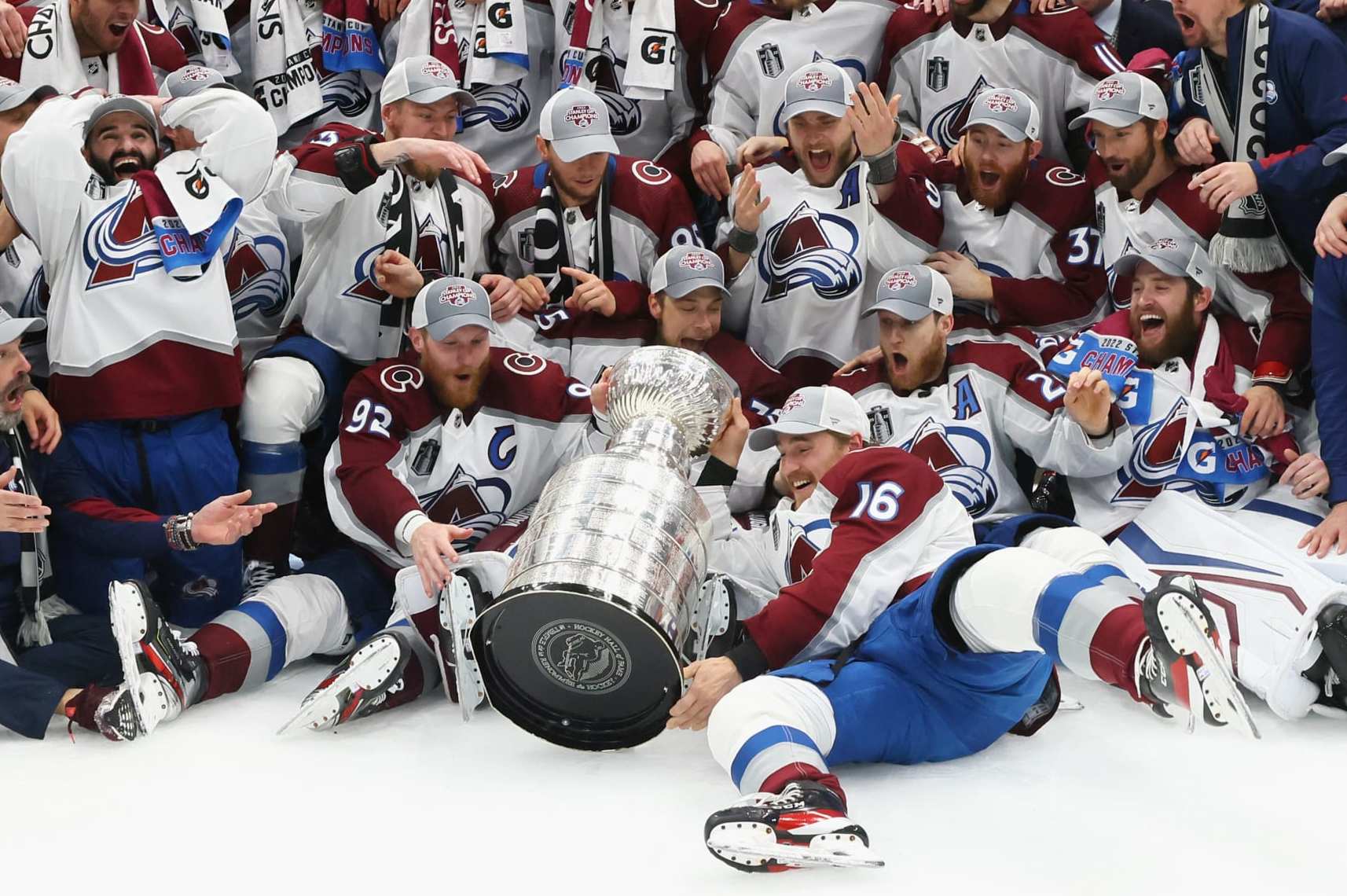 TAMPA, FLORIDA - JUNE 26: The Colorado Avalanche ding the Stanley Cup after their victory over the Tampa Bay Lightning in Game Six of the 2022 NHL Stanley Cup Final at Amalie Arena on June 26, 2022 in Tampa, Florida. (Photo by Bruce Bennett/Getty Images)