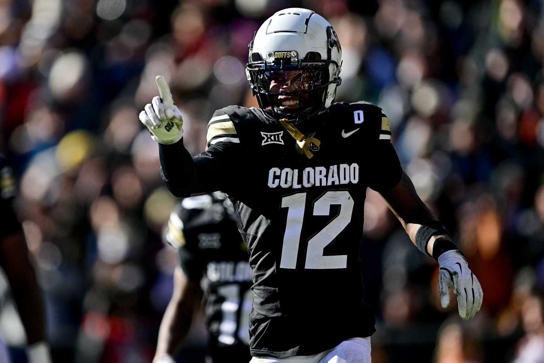 BOULDER, CO - NOVEMBER 29:  Travis Hunter #12 of the Colorado Buffaloes celebrates after a score in the third quarter against the Oklahoma State Cowboys at Folsom Field on November 29, 2024 in Boulder, Colorado. (Photo by Dustin Bradford/Getty Images)