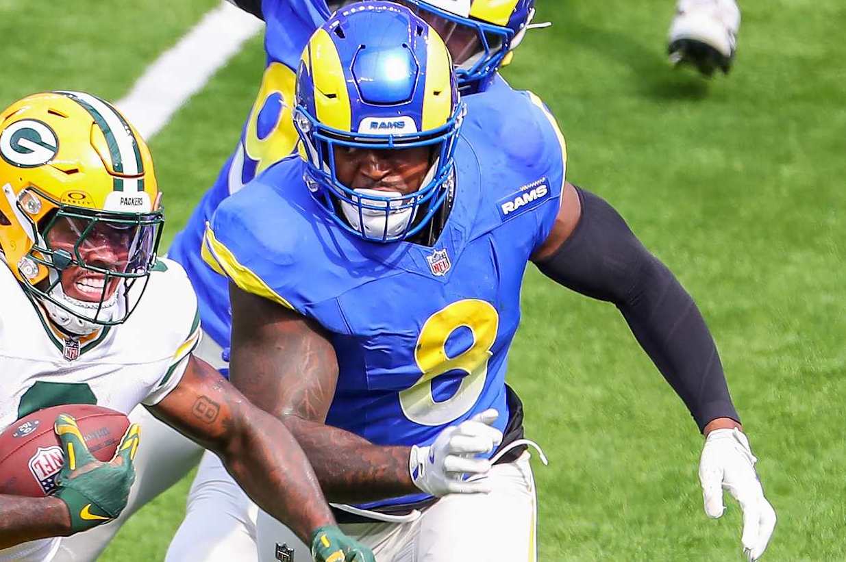 INGLEWOOD, CA - OCTOBER 6:Green Bay Packers wide receiver Christian Watson (9) runs away Los Angeles Rams linebacker Jared Verse (8) during the NFL game between the Green Bay Packers and the Los Angeles Rams on October 06, 2024, at SoFi Stadium in Inglewood, CA. (Photo by Jevone Moore/Icon Sportswire via Getty Images)