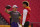 Minnesota Vikings quarterback Kirk Cousins, left, warms up alongside Kansas City Chiefs quarterback Patrick Mahomes before a preseason NFL football game Friday, Aug. 27, 2021, in Kansas City, Mo. (AP Photo/Charlie Riedel)