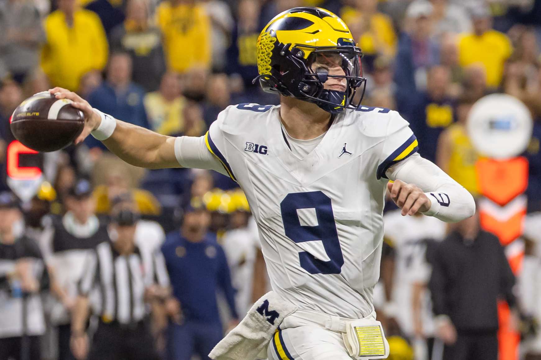 INDIANAPOLIS, INDIANA - DECEMBER 2: J.J. McCarthy #9 of the Michigan Wolverines throws the ball against the Iowa Hawkeyes during the Big Ten Championship at Lucas Oil Stadium on December 2, 2023 in Indianapolis, Indiana. (Photo by Michael Hickey/Getty Images)