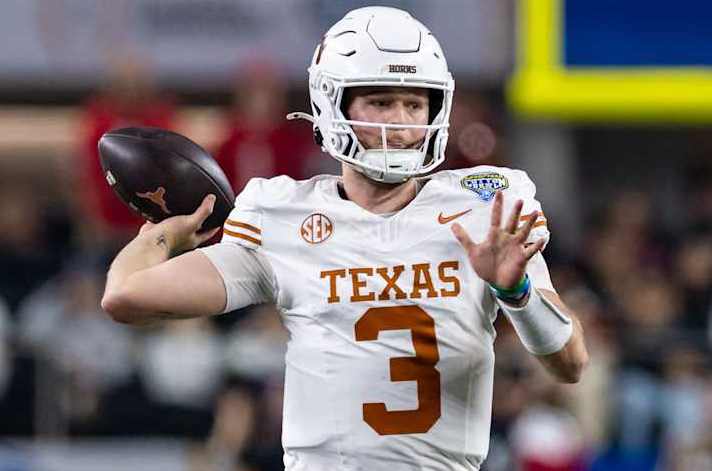 ARLINGTON, TX - JANUARY 10: Texas Longhorns quarterback Quinn Ewers (#3) throws a pass during the CFP Semifinal Cotton Bowl Classic football game between the Ohio State Buckeyes and Texas Longhorns on January 10, 2025 at AT&T Stadium in Arlington, TX. (Photo by Matthew Visinsky/Icon Sportswire via Getty Images)