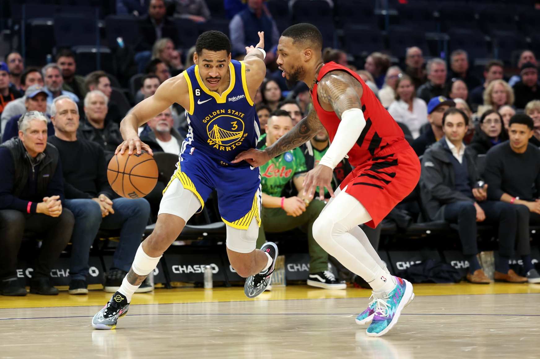 SAN FRANCISCO, CALIFORNIA - FEBRUARY 28: Jordan Poole #3 of the Golden State Warriors dribbles the ball against Damian Lillard #0 of the Portland Trail Blazers at Chase Center on February 28, 2023 in San Francisco, California.  NOTE TO USER: User expressly acknowledges and agrees that, by downloading and or using this photograph, User is consenting to the terms and conditions of the Getty Images License Agreement.  (Photo by Ezra Shaw/Getty Images)