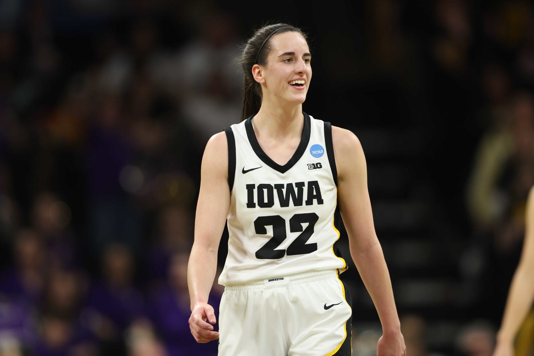 IOWA CITY, IOWA - MARCH 23: Caitlin Clark #22 of the Iowa Hawkeyes looks on after scoring a basket against the Holy Cross Crusaders during the first round of the 2024 NCAA Women's Basketball Tournament held at Carver-Hawkeye Arena on March 23, 2024 in Iowa City, Iowa. (Photo by Rebecca Gratz/NCAA Photos via Getty Images)