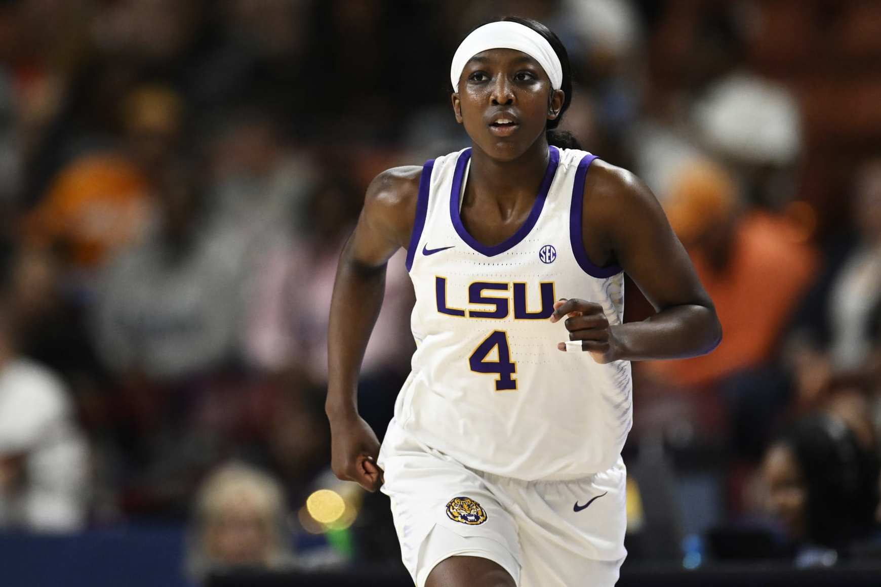 GREENVILLE, SOUTH CAROLINA - MARCH 09: Flau'jae Johnson #4 of the LSU Lady Tigers runs up the court against the Ole Miss Rebels in the second quarter during the semifinals of the SEC Women's Basketball Tournament at Bon Secours Wellness Arena on March 09, 2024 in Greenville, South Carolina.  (Photo by Eakin Howard/Getty Images)