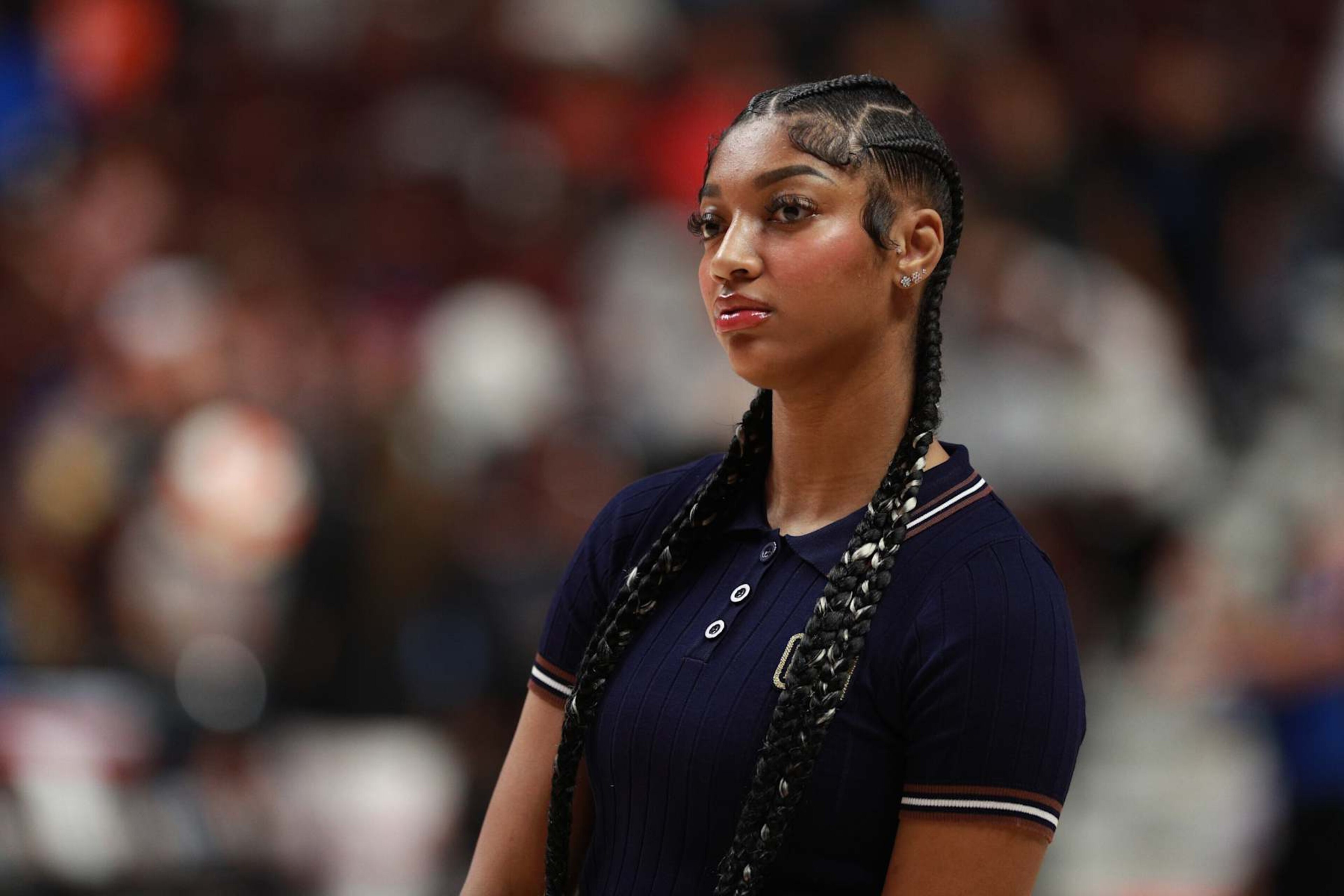 UNCASVILLE, CT - SEPTEMBER 19: Angel Reese #5 of the Chicago Sky looks on during the game against the Connecticut Sun on September 19, 2024 at the Mohegan Sun Arena in Uncasville, Connecticut. NOTE TO USER: User expressly acknowledges and agrees that, by downloading and or using this photograph, User is consenting to the terms and conditions of the Getty Images License Agreement. Mandatory Copyright Notice: Copyright 2024 NBAE (Photo by Chris Marion/NBAE via Getty Images)