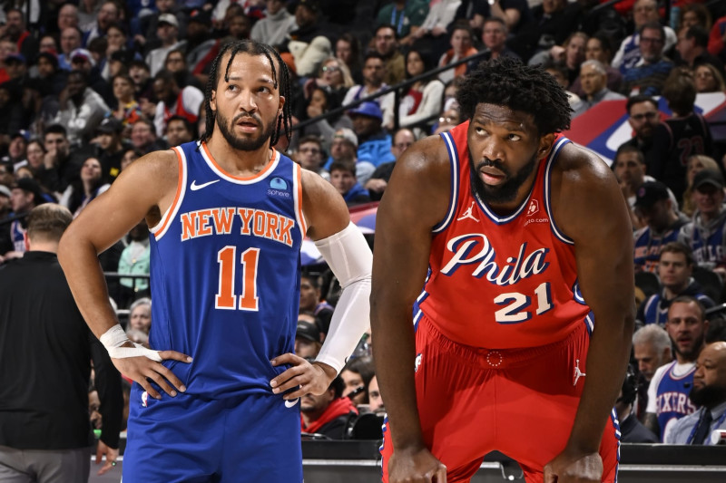 PHILADELPHIA, PA - JANUARY 5: Jalen Brunson #11 of the New York Knicks and Joel Embiid #21 of the Philadelphia 76ers look on during the game on January 5, 2024 at the Wells Fargo Center in Philadelphia, Pennsylvania NOTE TO USER: User expressly acknowledges and agrees that, by downloading and/or using this Photograph, user is consenting to the terms and conditions of the Getty Images License Agreement. Mandatory Copyright Notice: Copyright 2024 NBAE (Photo by David Dow/NBAE via Getty Images)