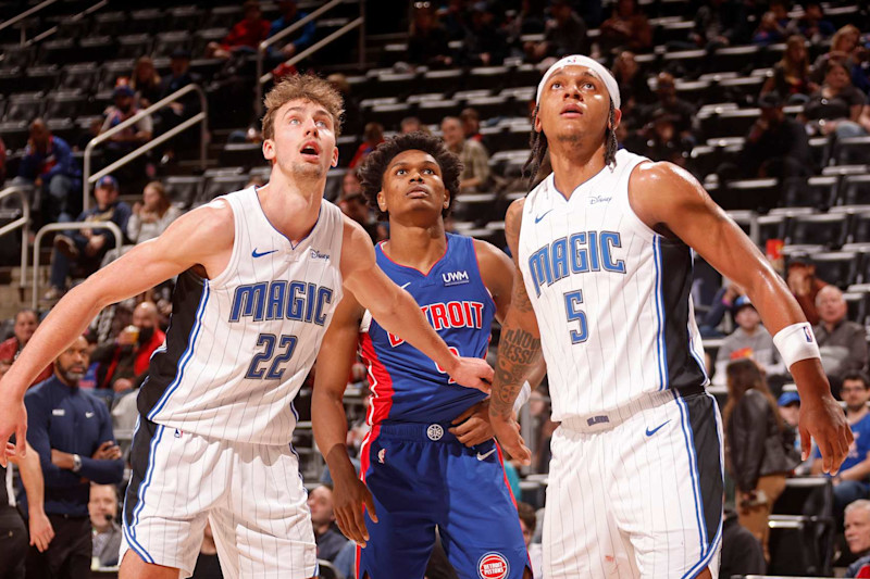 DETROIT, MI - FEBRUARY 4: Franz Wagner #22 and Paolo Banchero #5 of the Orlando Magic box out during the game against the Detroit Pistons on February 4, 2024 at Little Caesars Arena in Detroit, Michigan. NOTE TO USER: User expressly acknowledges and agrees that, by downloading and/or using this photograph, User is consenting to the terms and conditions of the Getty Images License Agreement. Mandatory Copyright Notice: Copyright 2024 NBAE (Photo by Brian Sevald/NBAE via Getty Images)