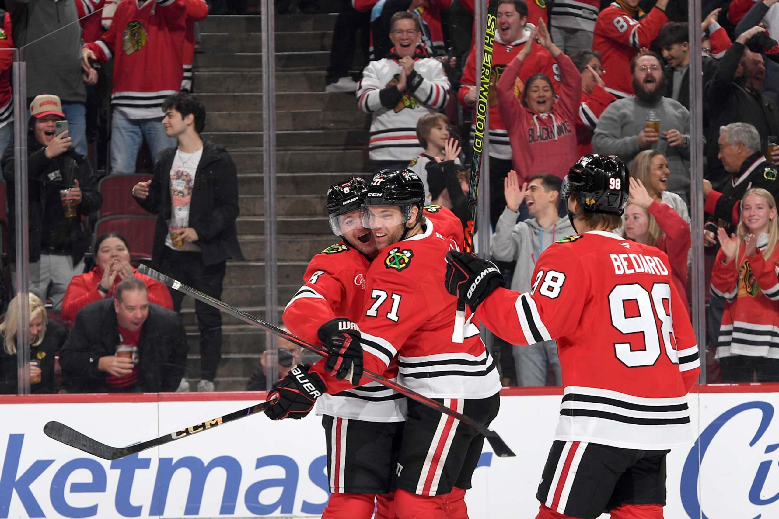 Chicago Blackhawks forward Ryan Donato (left) and Taylor Hall. 