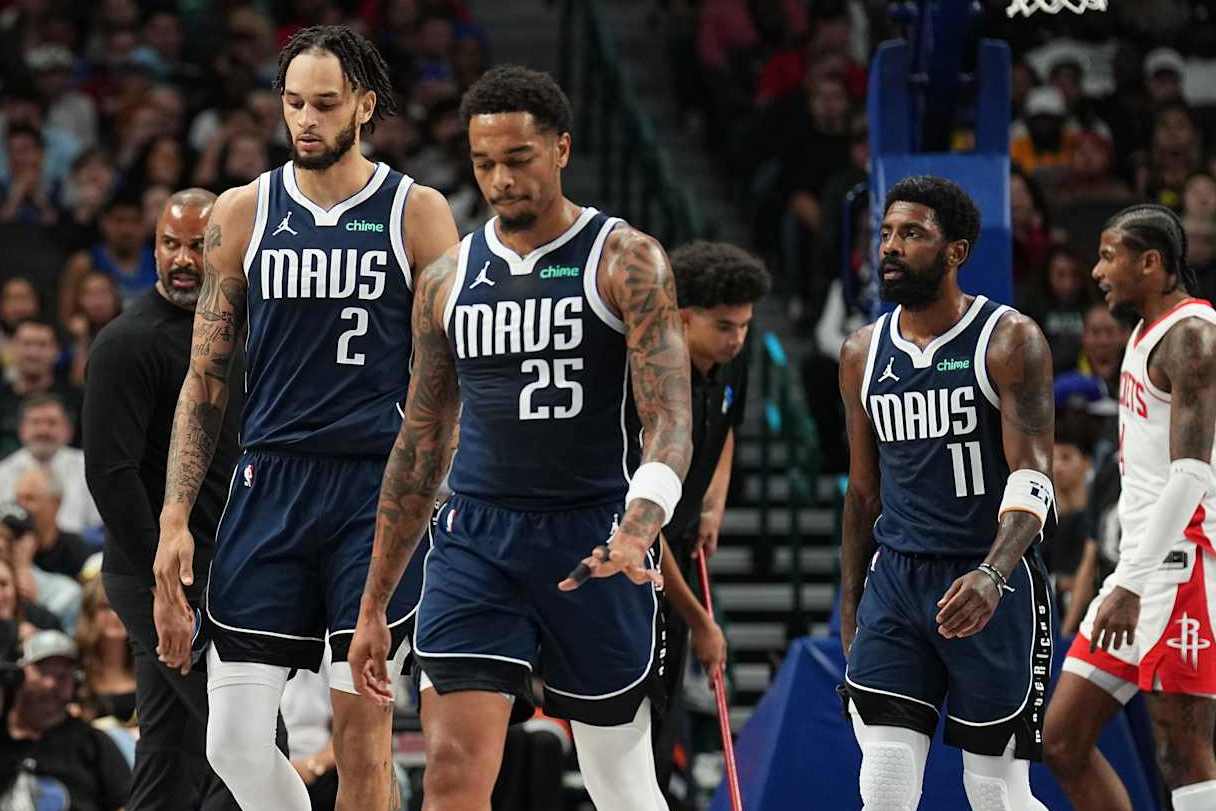 DALLAS, TX - OCTOBER 31: Luka Doncic #77, Dereck Lively II #2 , P.J Washington #25 , and Kyrie Irving #11 of the Dallas Mavericks look during the game against the Houston Rockets on October 31, 2024 at American Airlines Center in Dallas, Texas. NOTE TO USER: User expressly acknowledges and agrees that, by downloading and or using this photograph, User is consenting to the terms and conditions of the Getty Images License Agreement. Mandatory Copyright Notice: Copyright 2024 NBAE (Photo by Glenn James/NBAE via Getty Images)