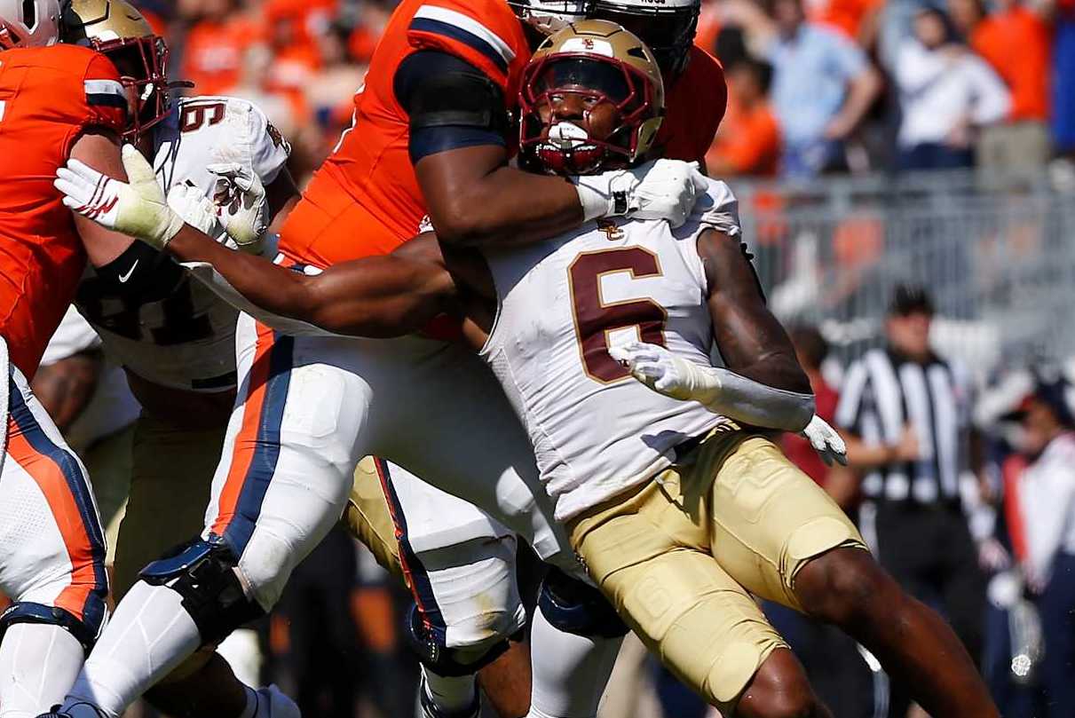CHARLOTTESVILLE, VA - OCTOBER 05: Boston College Eagles defensive lineman Donovan Ezeiruaku (6) pressures Virginia Cavaliers quarterback Anthony Colandrea (10) in the pocket during a college football game between the Boston College Eagles and the Virginia Cavaliers on October 5, 2024, at Scott Stadium in Charlottesville, VA. (Photo by Lee Coleman/Icon Sportswire via Getty Images)