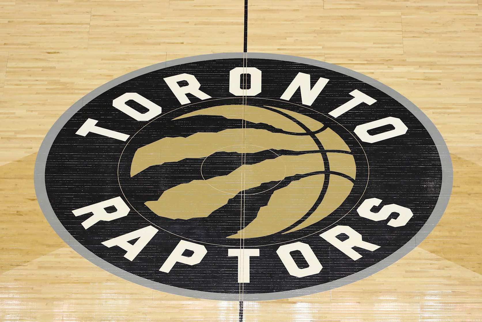 TORONTO, ON - JANUARY 26: The team logo decal at center court on Welcome Toronto night during the Toronto Raptors NBA game against the Utah Jazz at Air Canada Centre on January 26, 2018 in Toronto, Canada. NOTE TO USER: User expressly acknowledges and agrees that, by downloading and or using this photograph, User is consenting to the terms and conditions of the Getty Images License Agreement. (Photo by Tom Szczerbowski/Getty Images) *** Local Caption ***