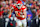 KANSAS CITY, MISSOURI - JANUARY 18: Travis Kelce #87 of the Kansas City Chiefs runs for yardage after a third quarter pass catch in the Divisional Round playoff at GEHA Field at Arrowhead Stadium on January 18, 2025 in Kansas City, Missouri. (Photo by David Eulitt/Getty Images)